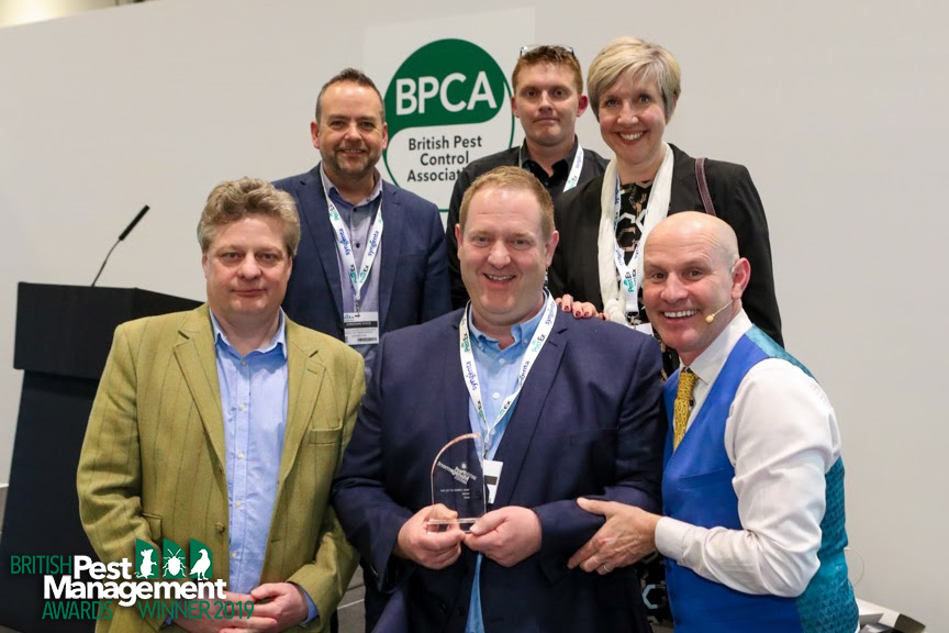 The Abate team, including Jon Blake centre (holding the award), with Henry Mott, a member of the BPMA’s judging panel (left) and event host, TV wildlife presenter Mike Dilger.